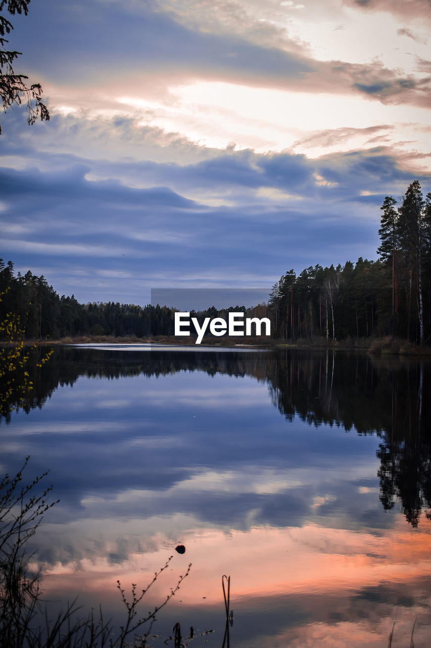 Scenic view of lake against sky during sunset