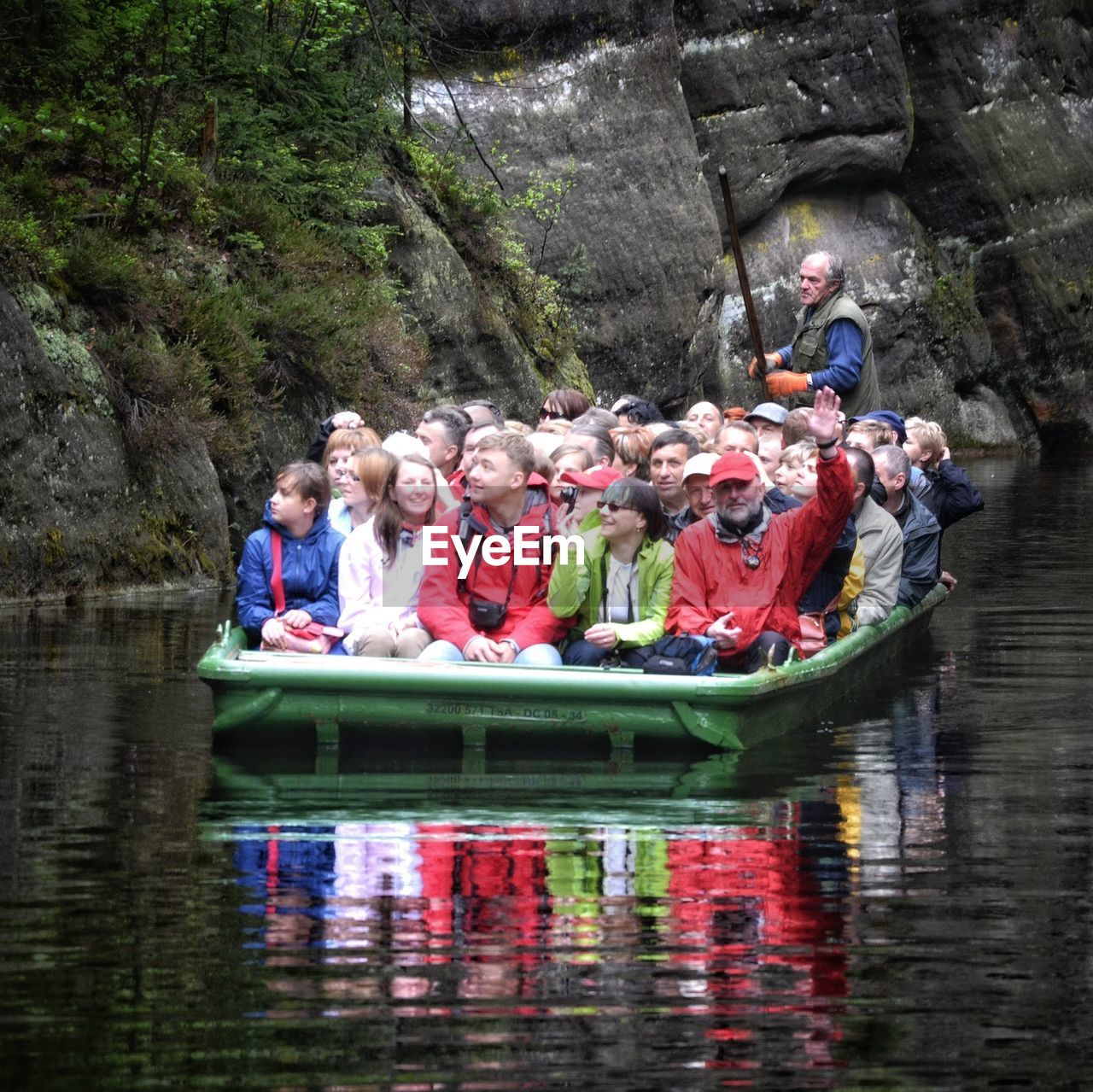 GROUP OF PEOPLE IN RIVER