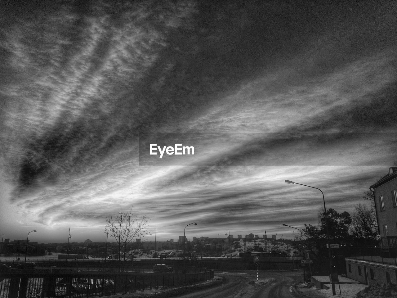 Street against sky at dusk