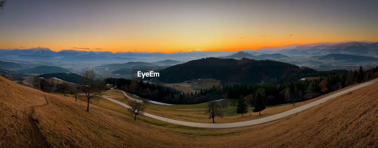 Panoramic view of landscape against sky during sunset