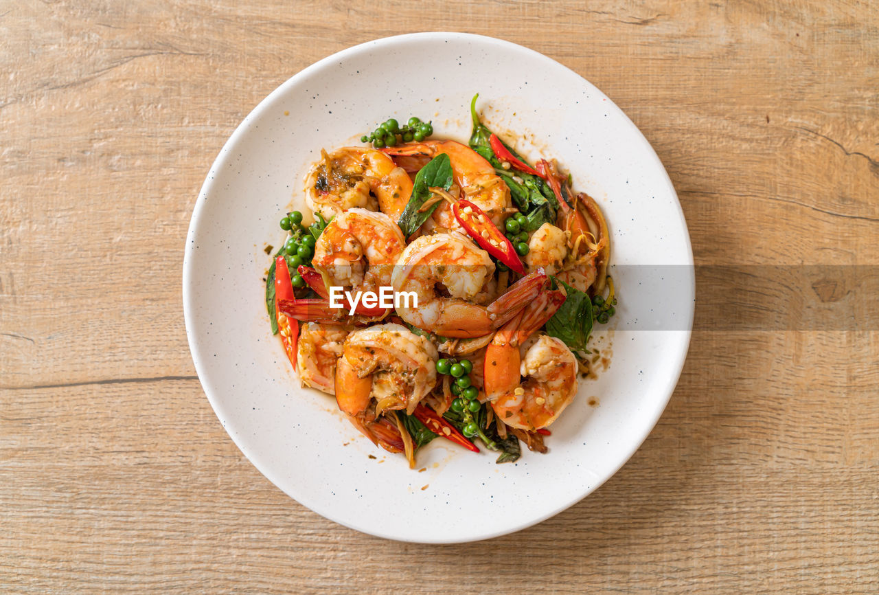 directly above shot of food served in plate on table