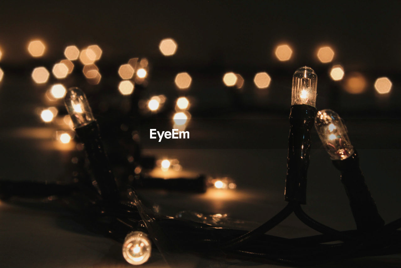 Close-up of illuminated string light on table