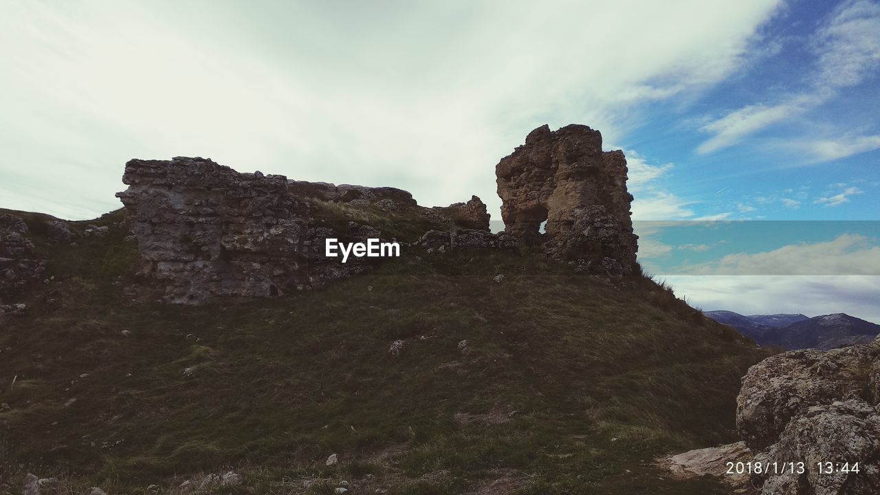 CLIFF AGAINST SKY