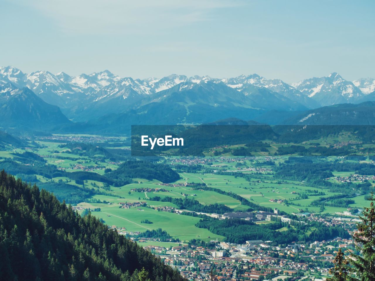 Scenic view of landscape and mountains against sky