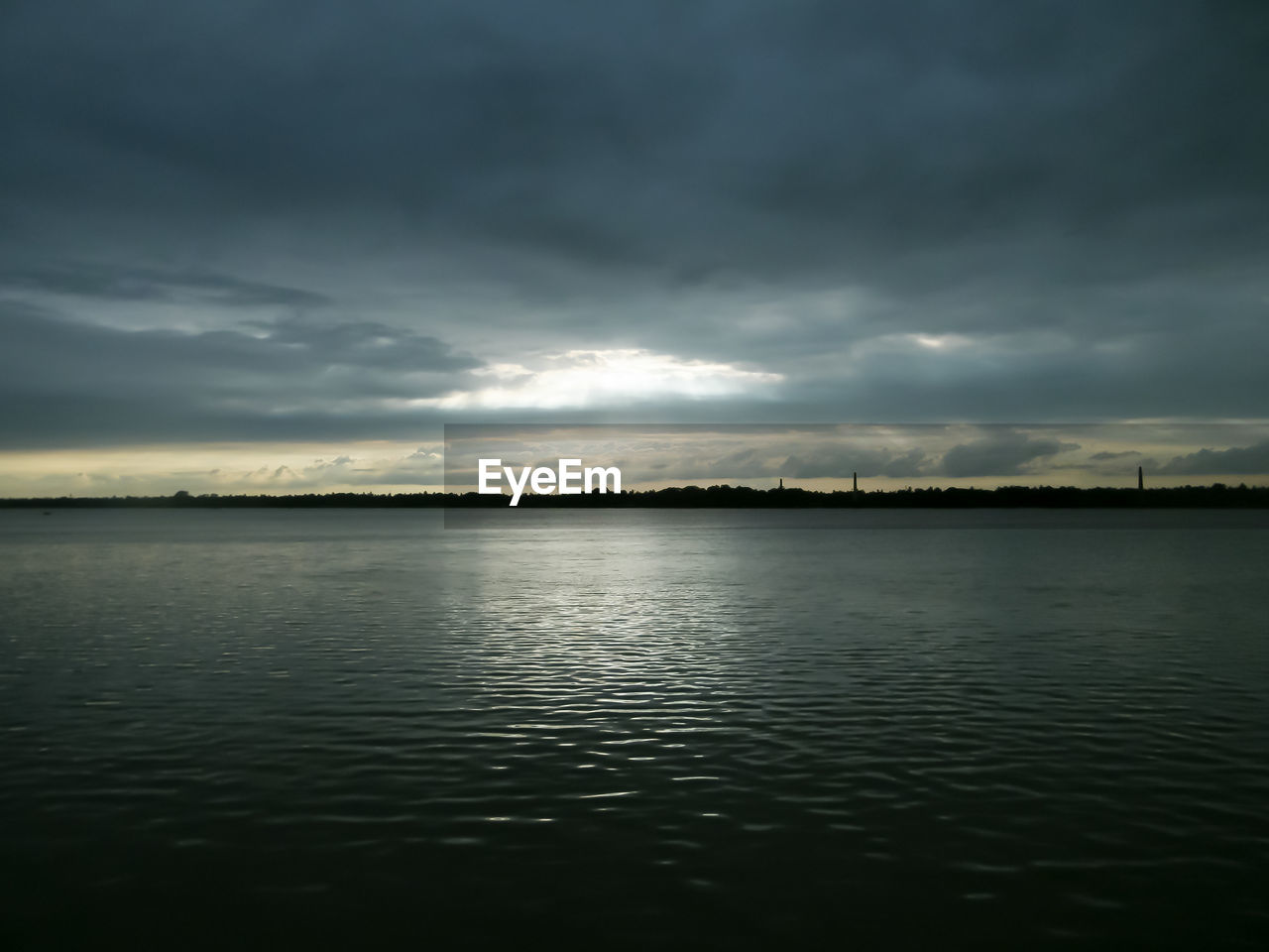 SCENIC VIEW OF SEA DURING SUNSET