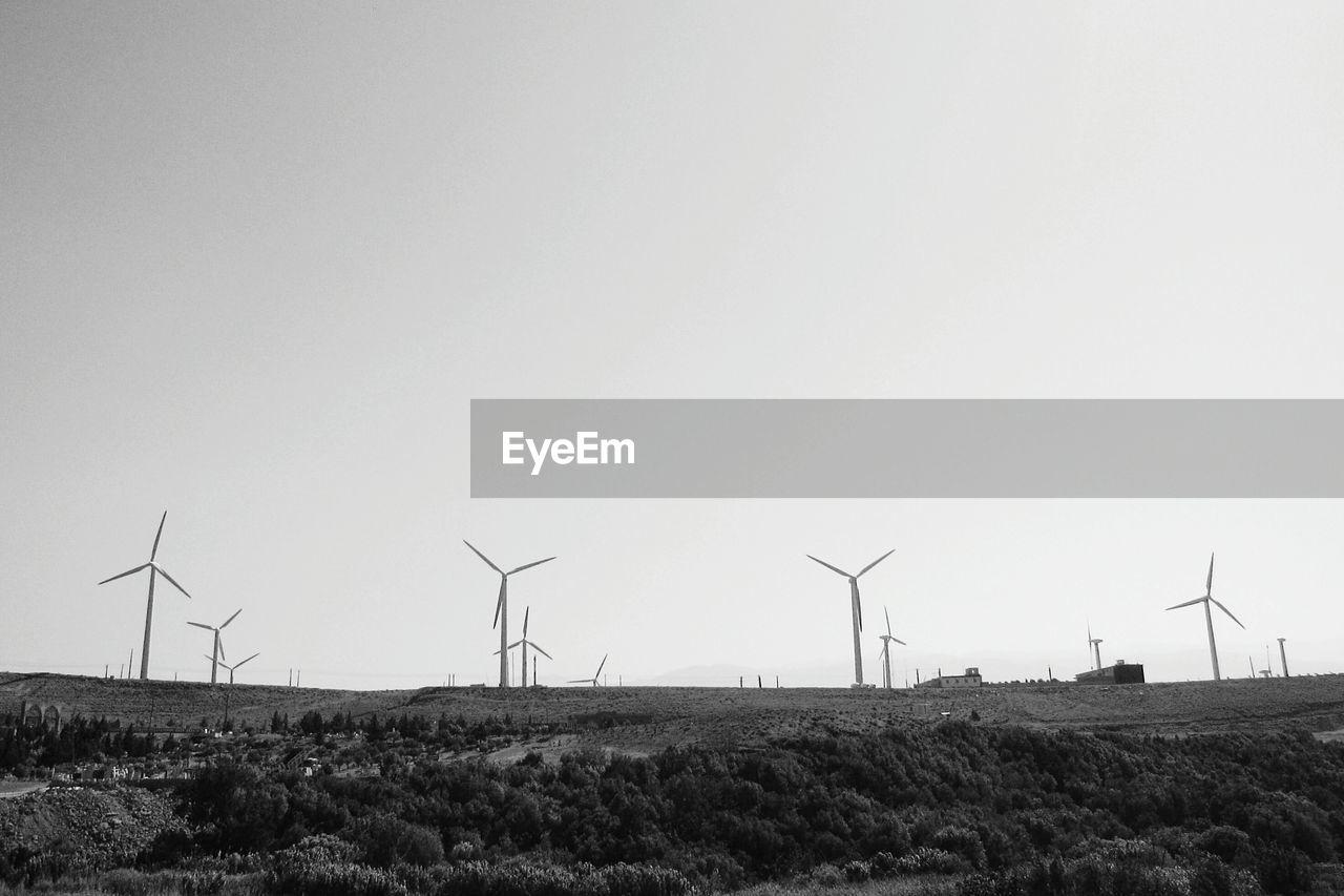 Traditional windmill on field