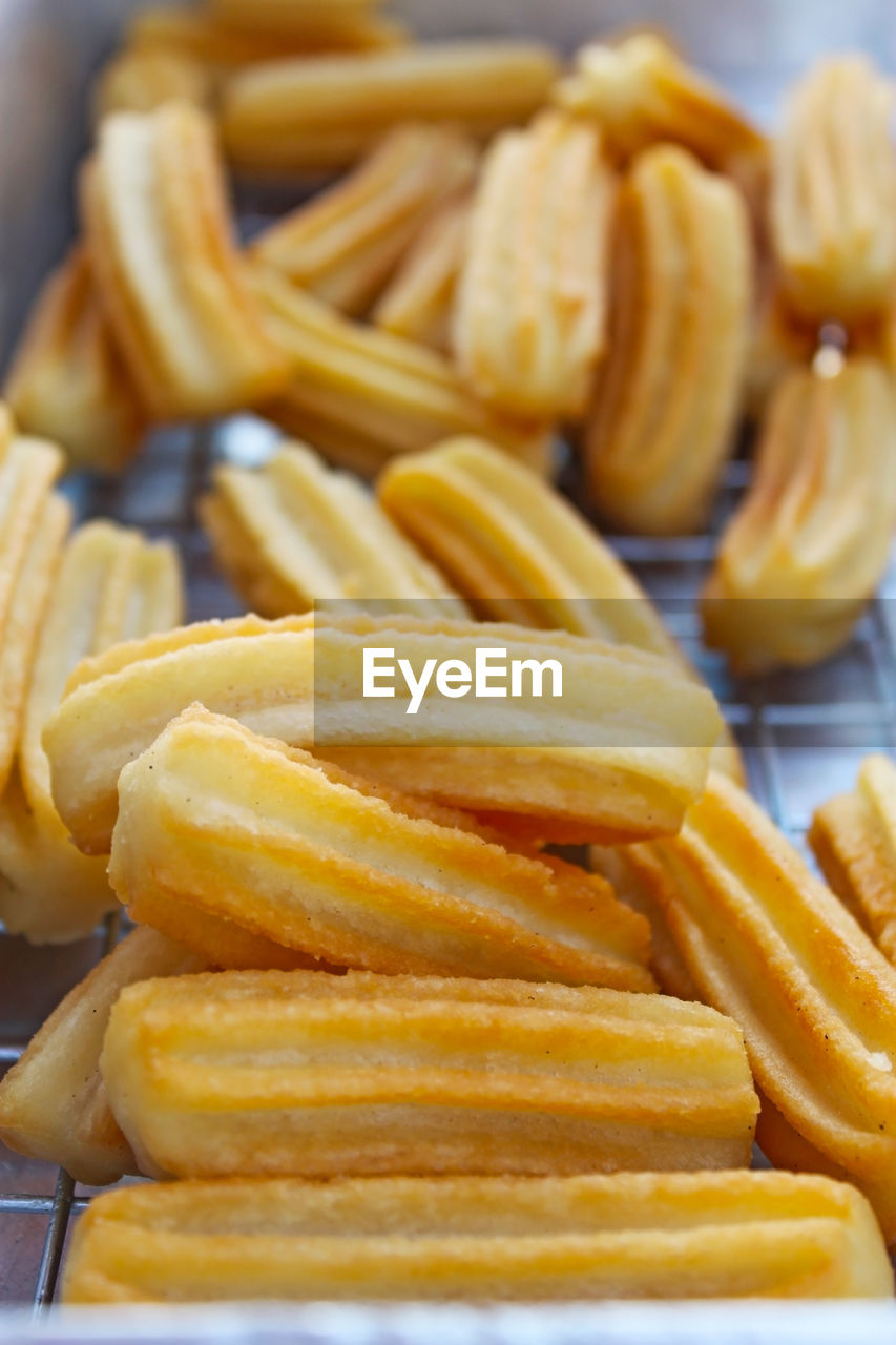 CLOSE-UP OF FRIES WITH MEAT AND VEGETABLES