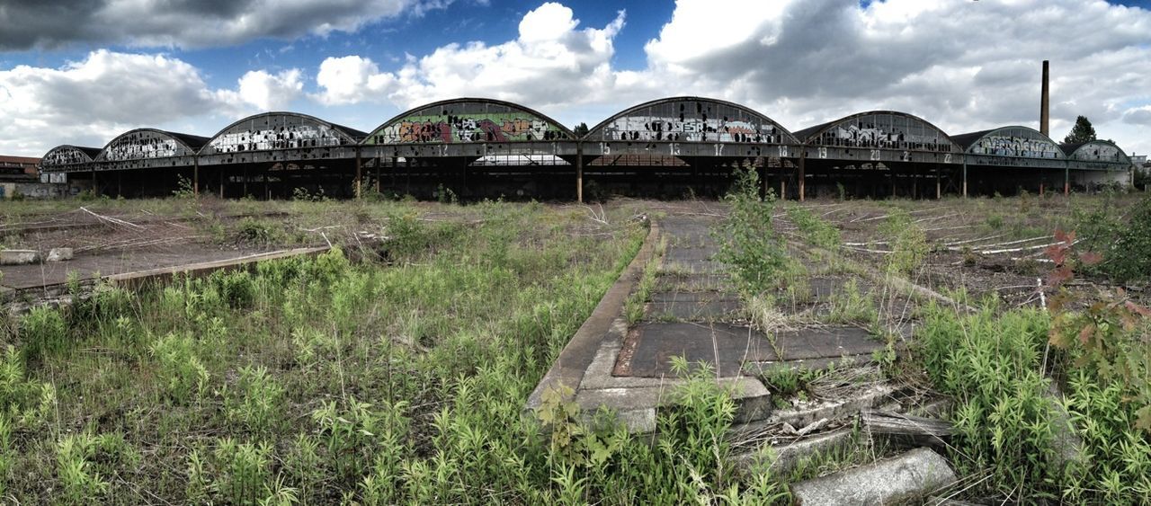 VIEW OF OLD BUILT STRUCTURE AGAINST CLOUDY SKY