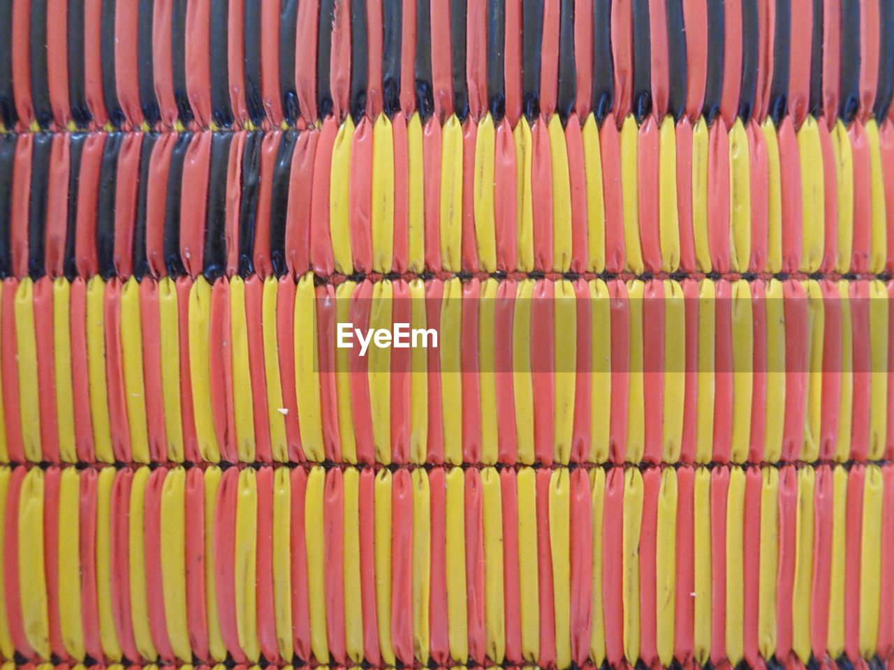 FULL FRAME SHOT OF CANDIES IN ROW
