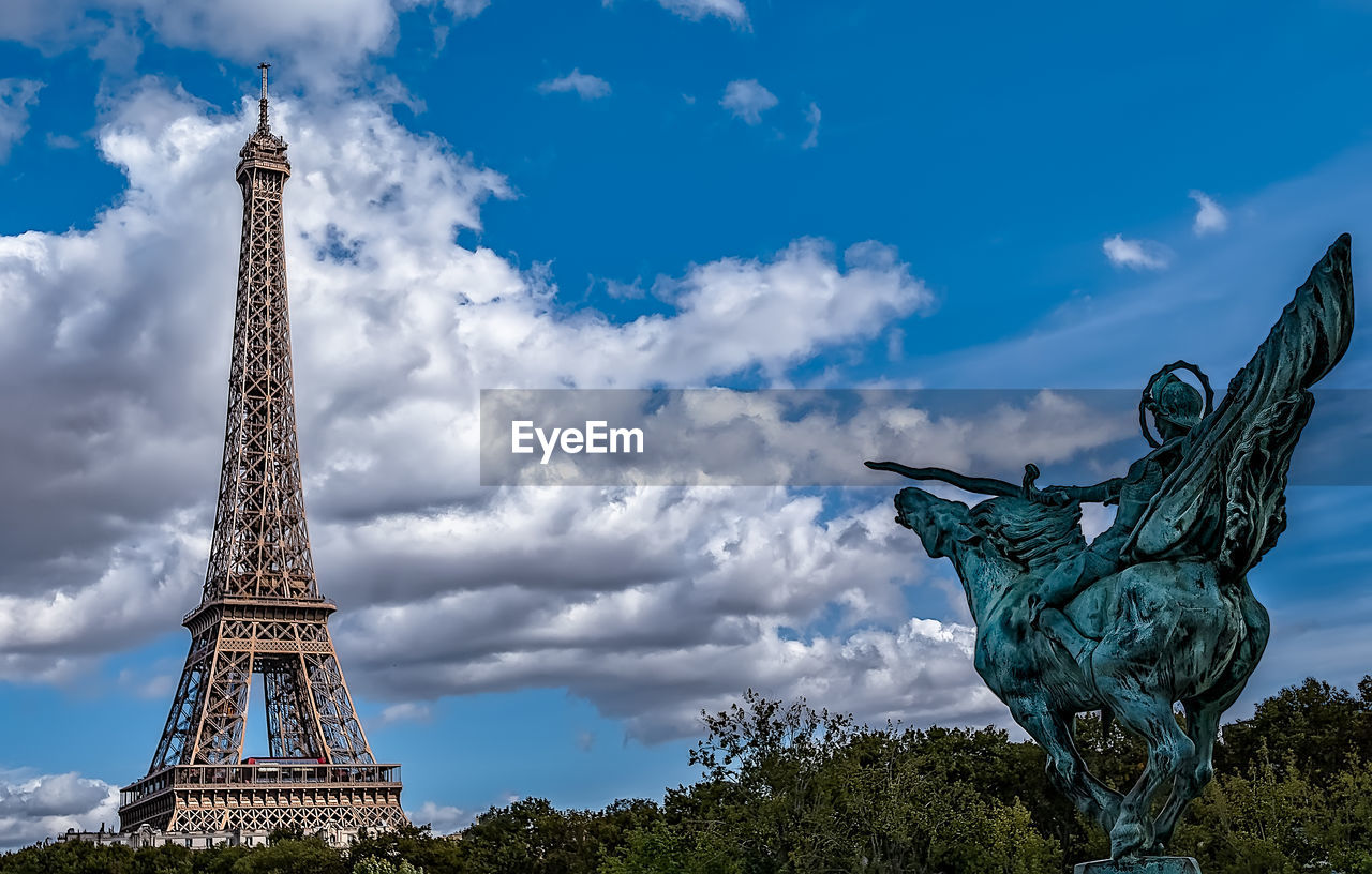LOW ANGLE VIEW OF STATUE OF TOWER