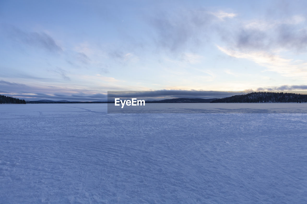 SCENIC VIEW OF SNOWCAPPED LANDSCAPE AGAINST SKY