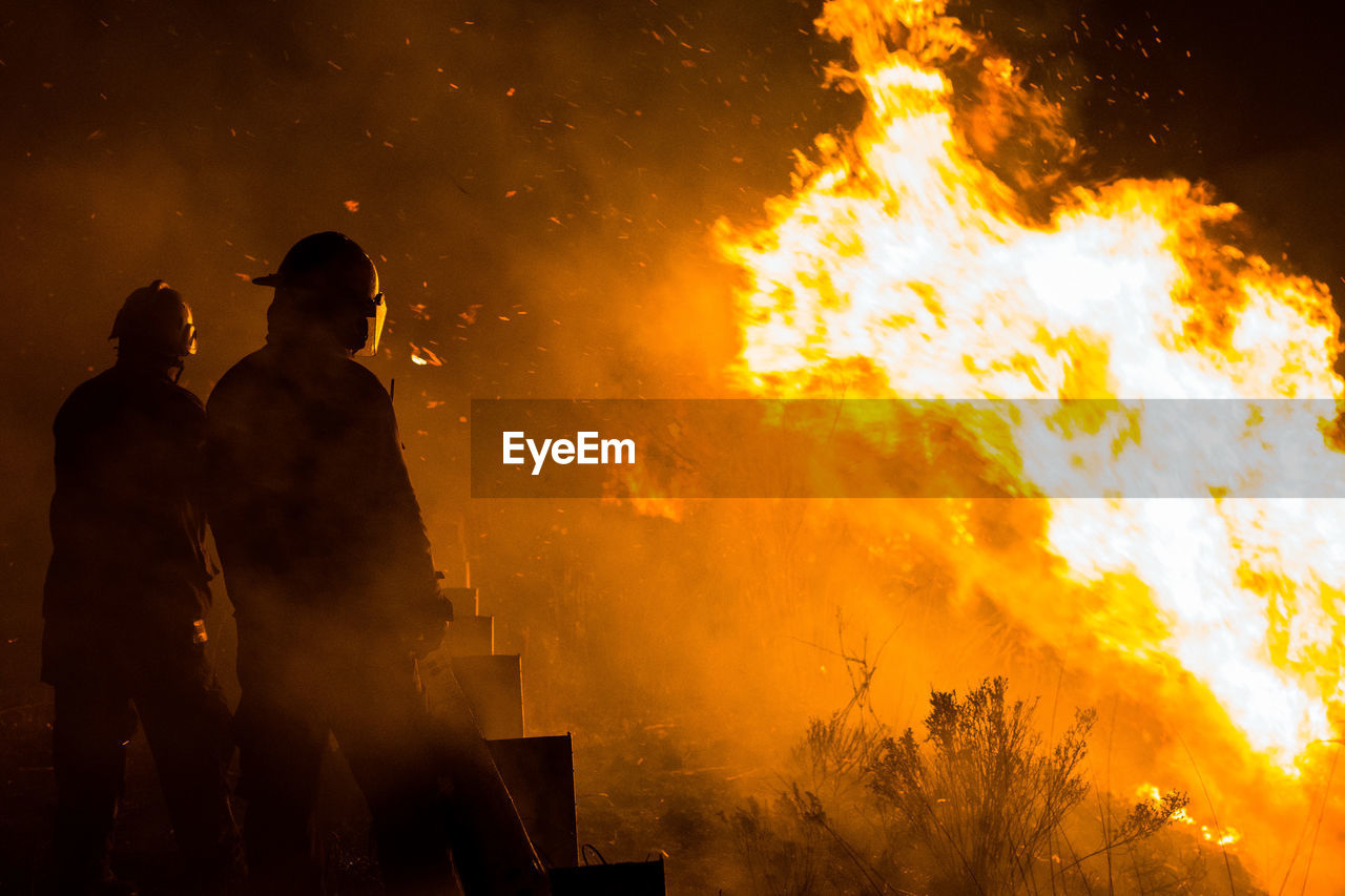 Firefighters working at night