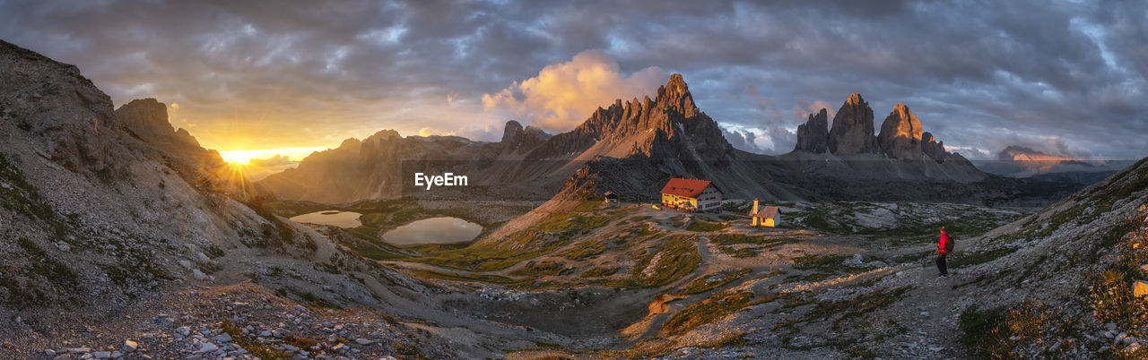 Panoramic view of mountains against sky during sunset