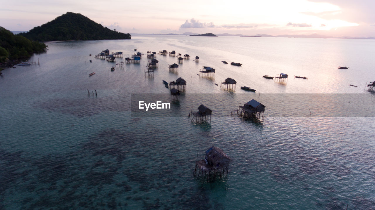 High angle view of sea against sky during sunset