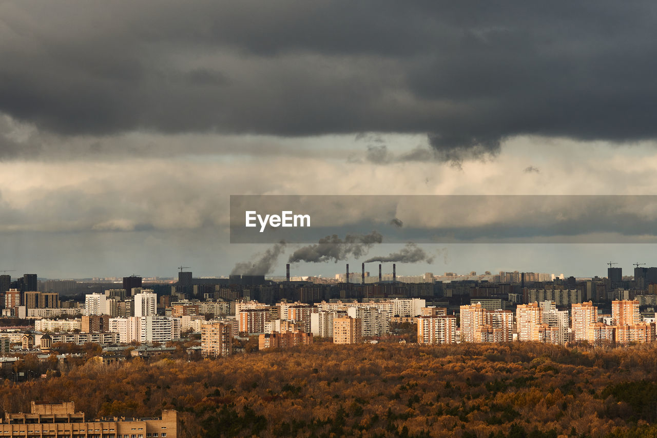 Industrial landscape. thermal power plant works and heats city, environmental pollution