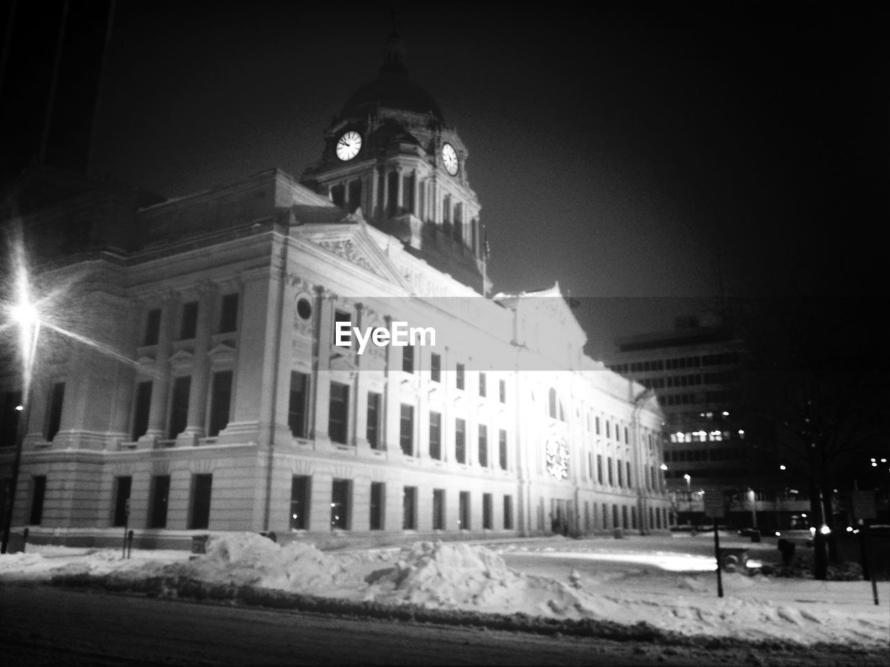 SNOW COVERED ILLUMINATED BUILDINGS