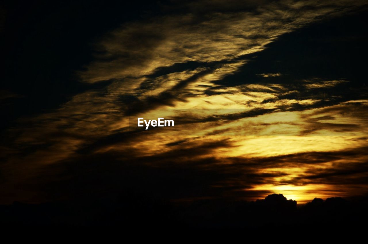 Scenic view of orange sky
