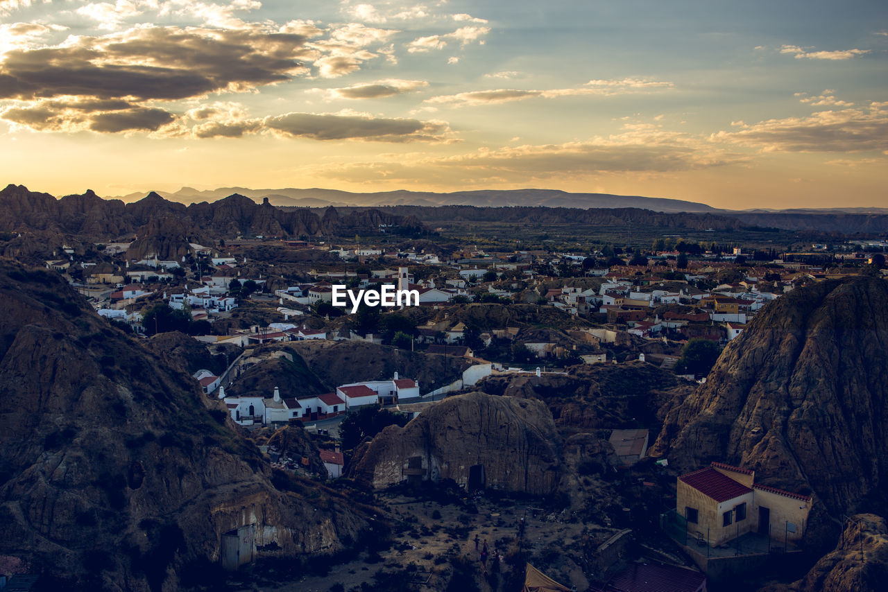 High angle view of townscape against sky at sunset