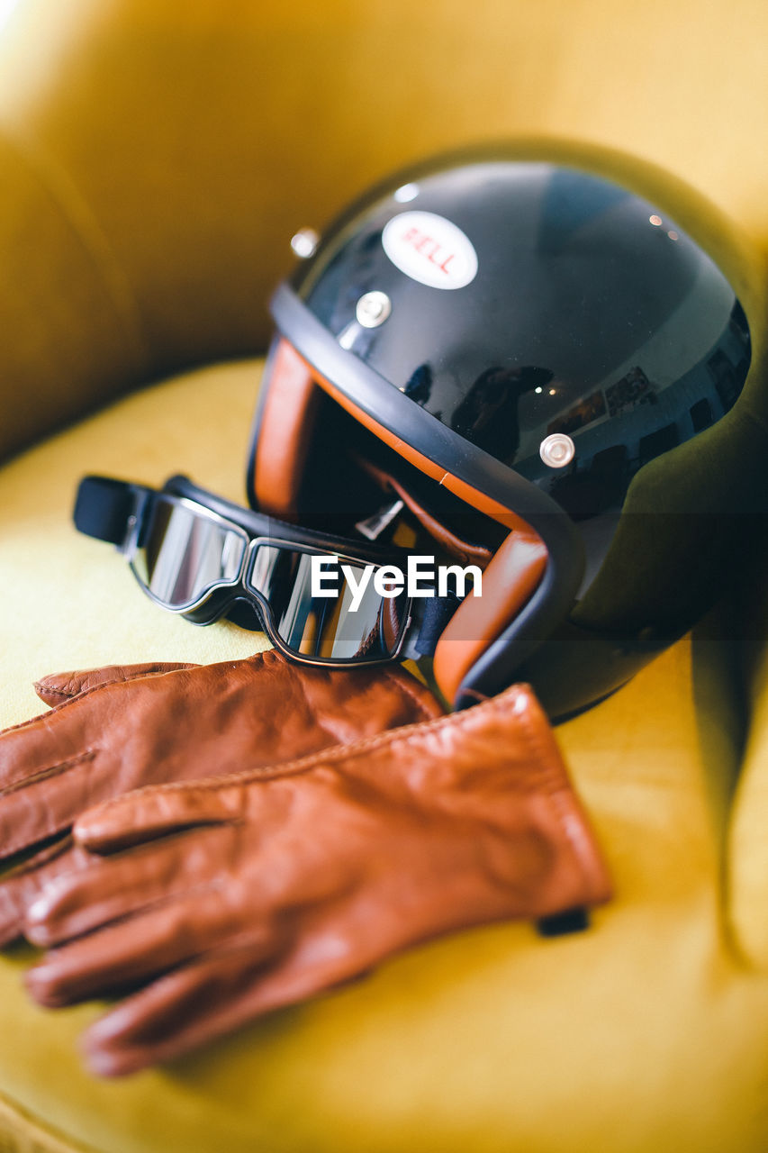yellow, hand, clothing, indoors, sports, selective focus, close-up