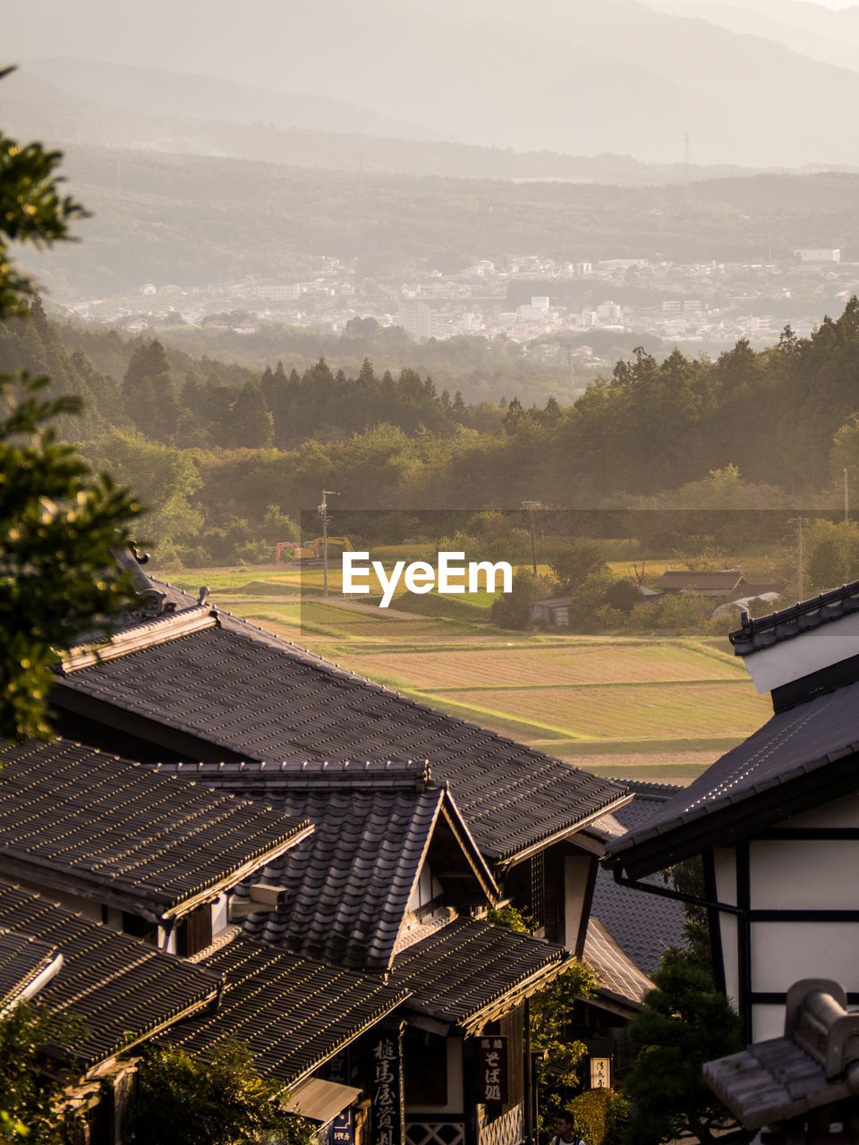 High angle view of houses and buildings against sky