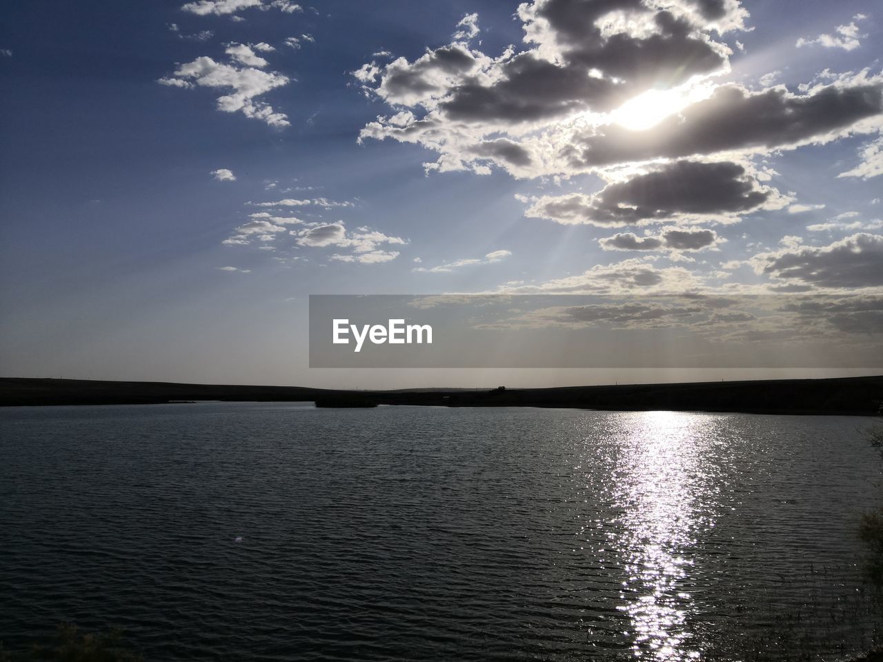 SCENIC VIEW OF SEA AGAINST SUNSET SKY