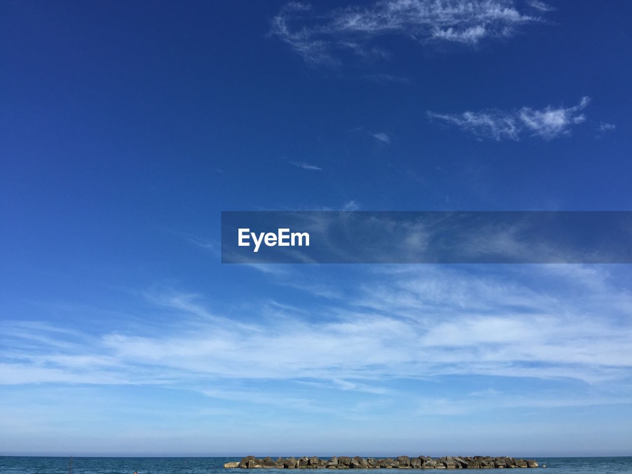 SCENIC VIEW OF BLUE SEA AGAINST SKY