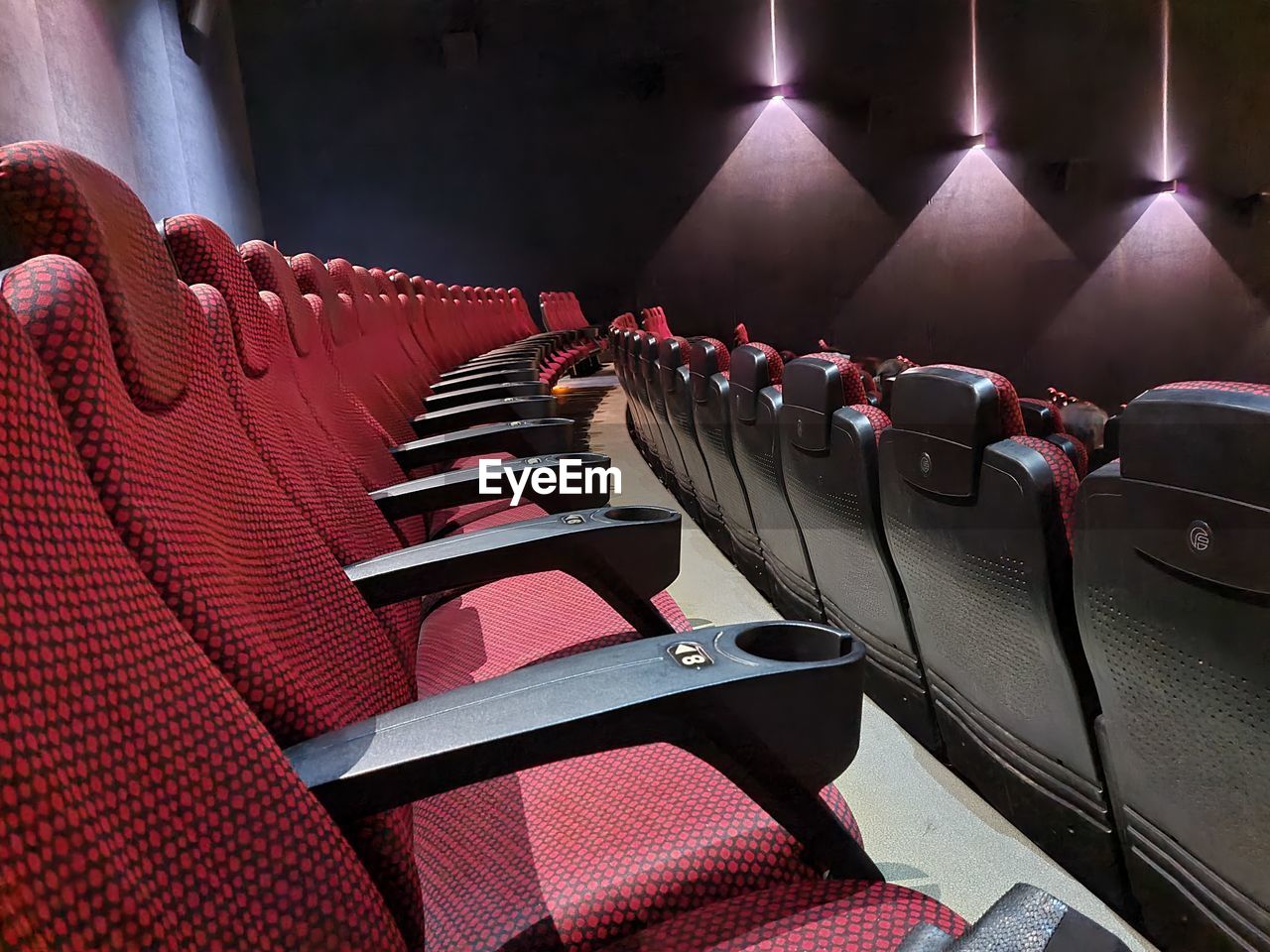 Empty multiplex chairs cinema