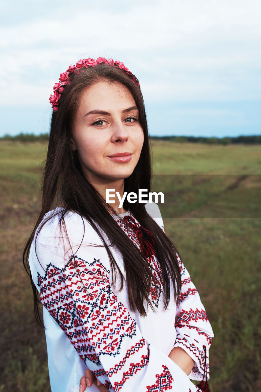 Beautiful caucasian woman in a folk costume