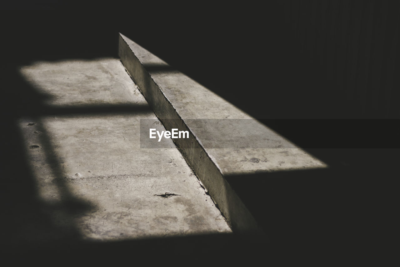 High angle view of shadow on table