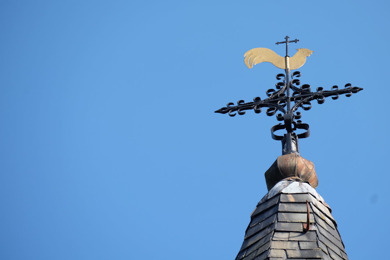 High section of church against clear blue sky