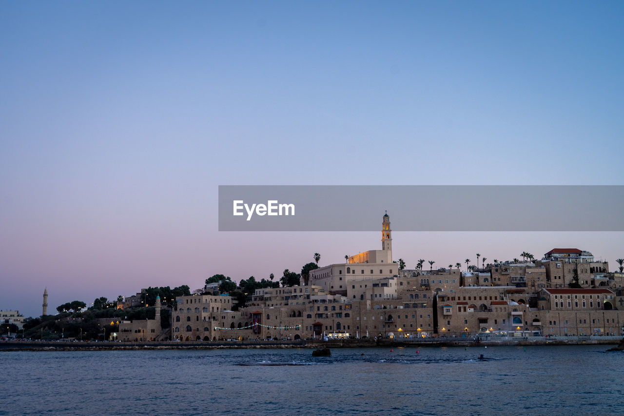 Old jaffa by sea against clear sky