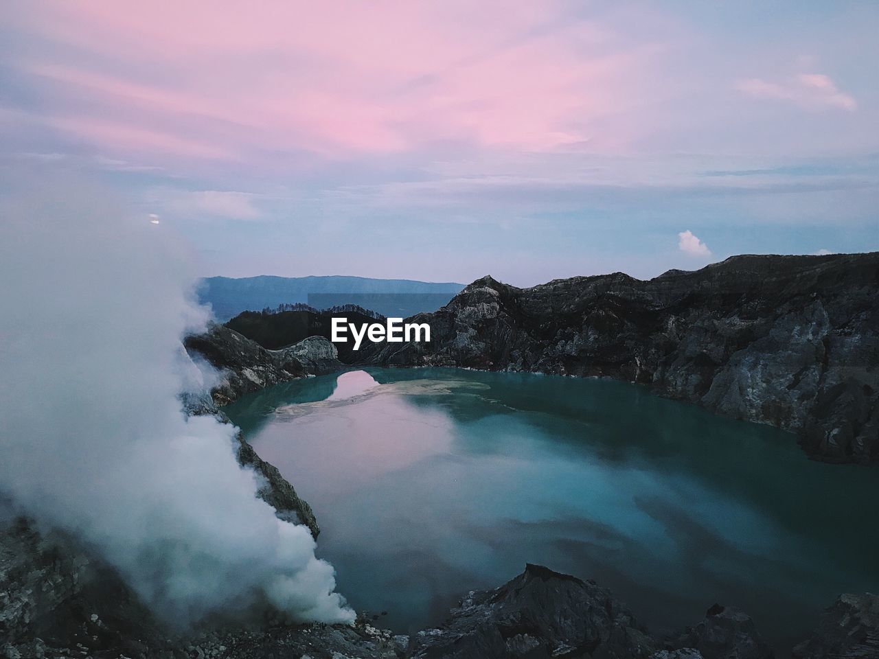 Scenic view of mountains against sky during sunset