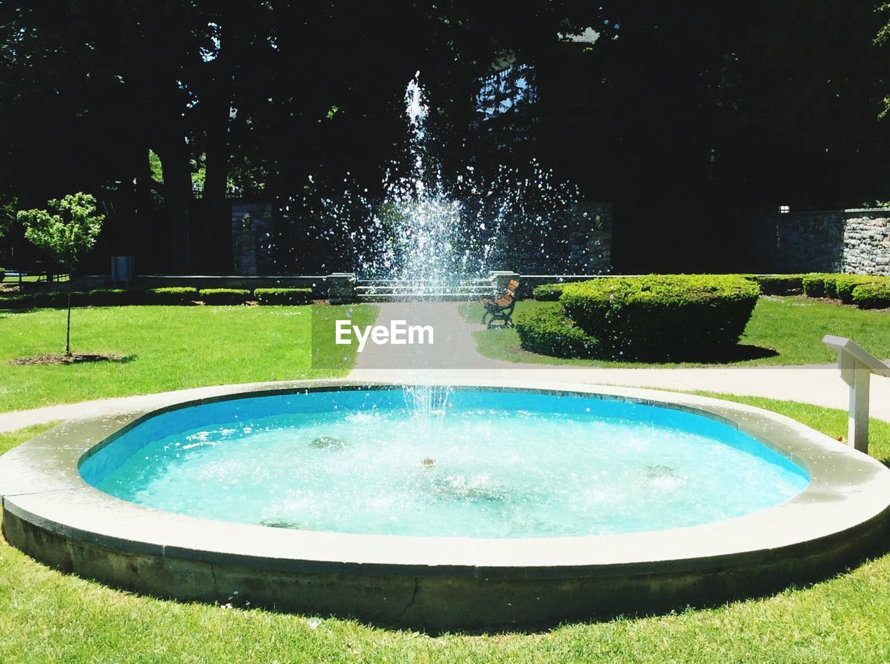 FOUNTAIN BY SWIMMING POOL