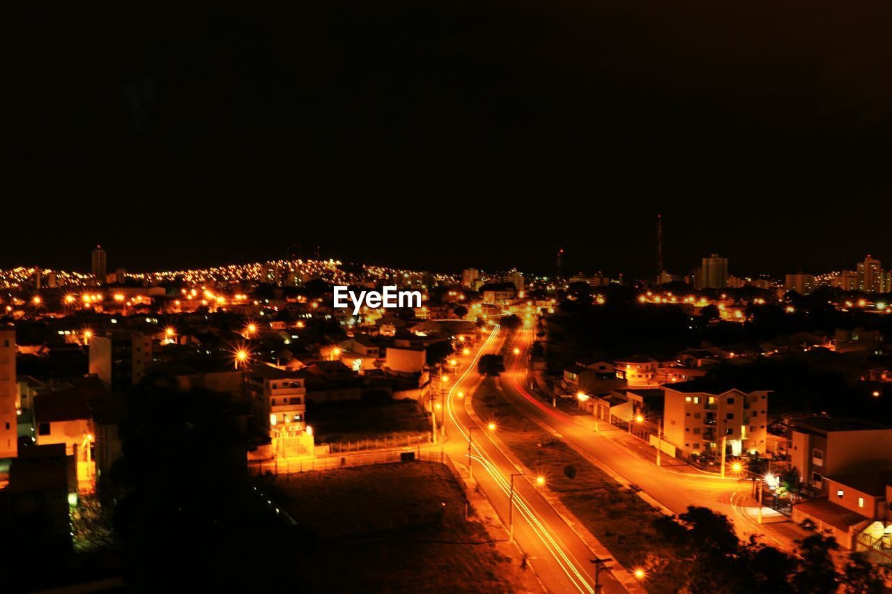 VIEW OF ILLUMINATED CITYSCAPE