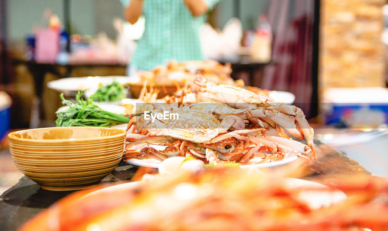 Seafood crab of restaurant with other dishes in the background
