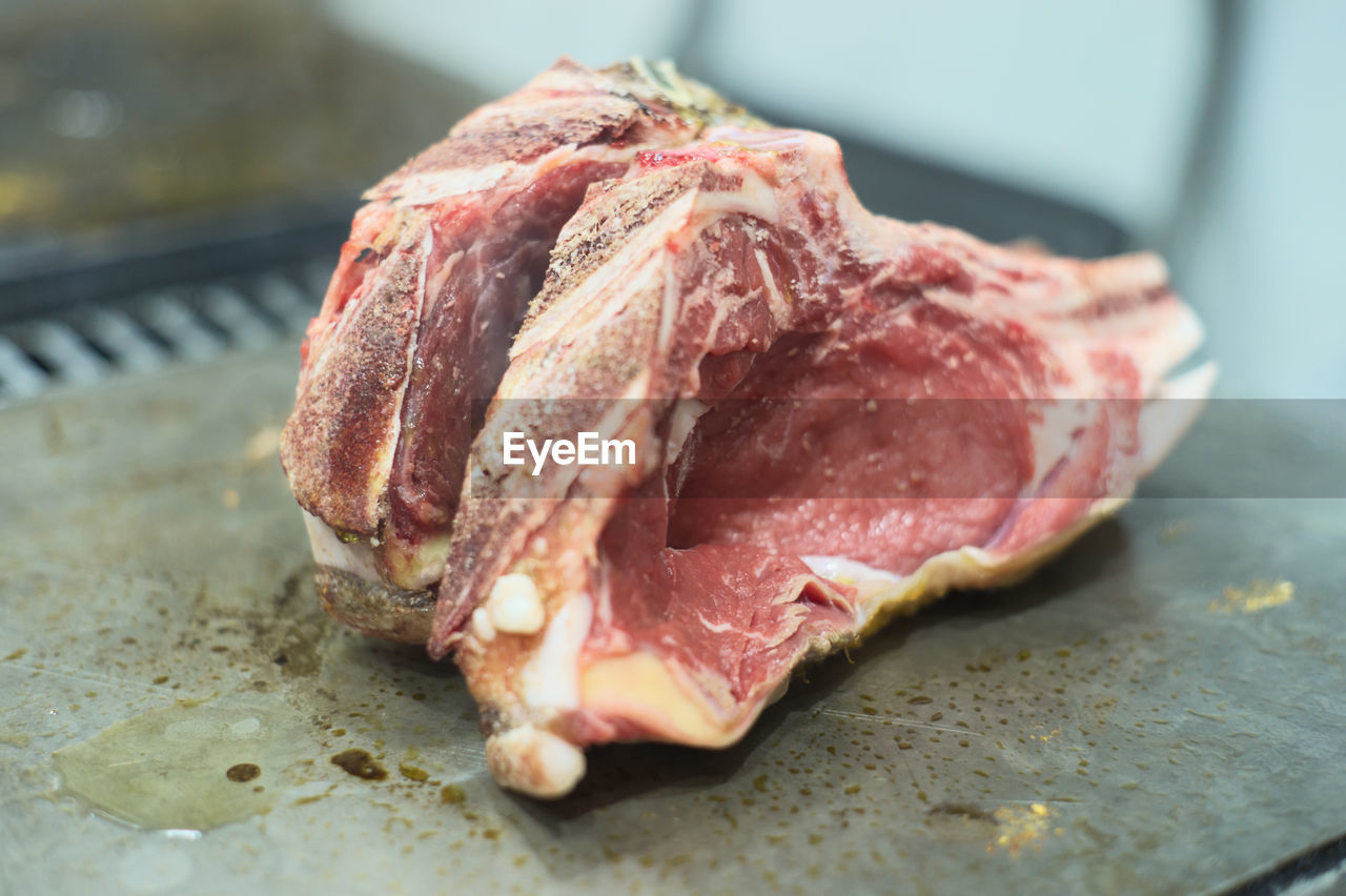 Close-up of meat on barbecue grill