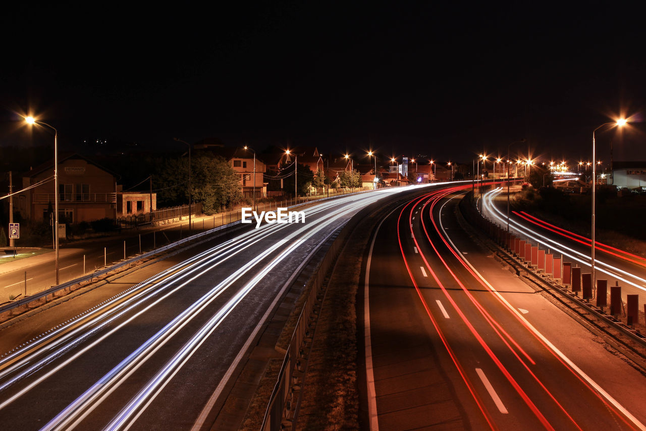 Light trails on road at night