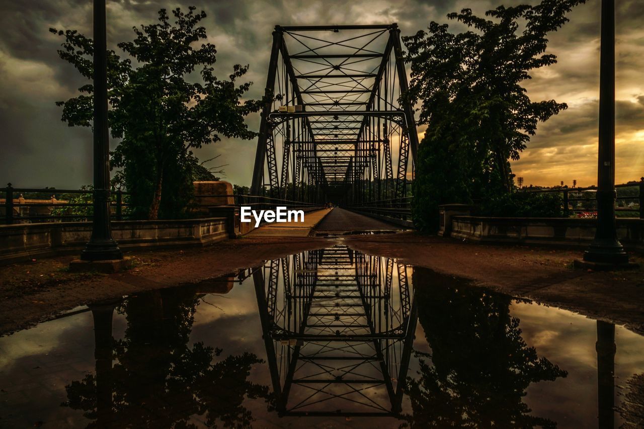 View of bridge against cloudy sky