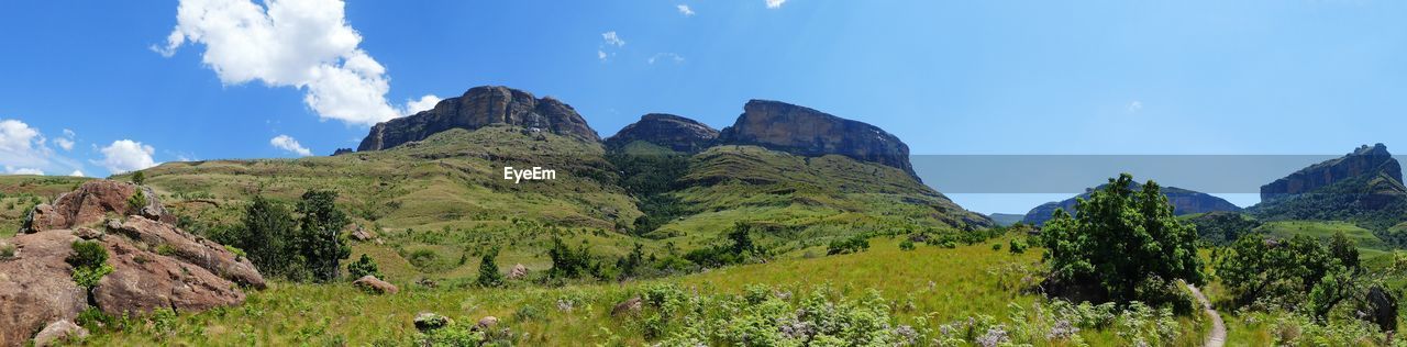 Panoramic shot of countryside landscape against sky