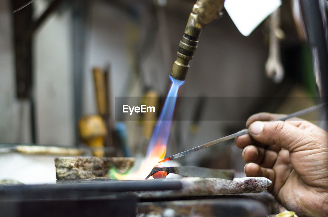 Close-up of person making ring