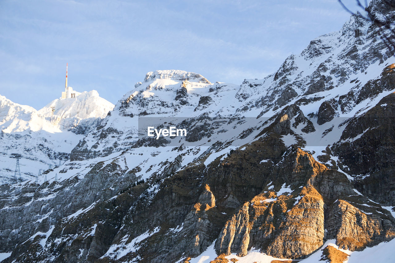 SNOWCAPPED MOUNTAINS AGAINST SKY