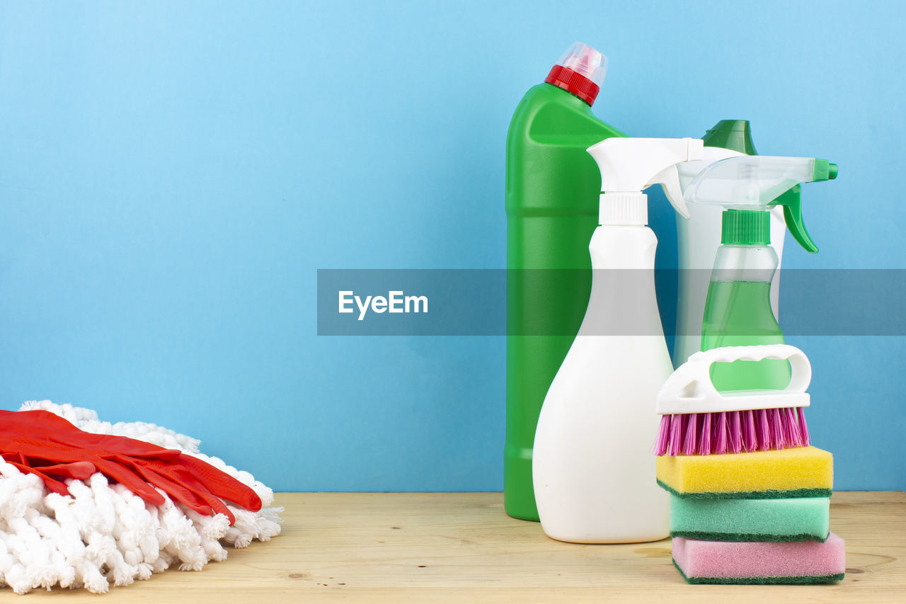 Cleaning tools. set of cleaning supplies - spray and cleaning agent, gloves, brush and sponge.