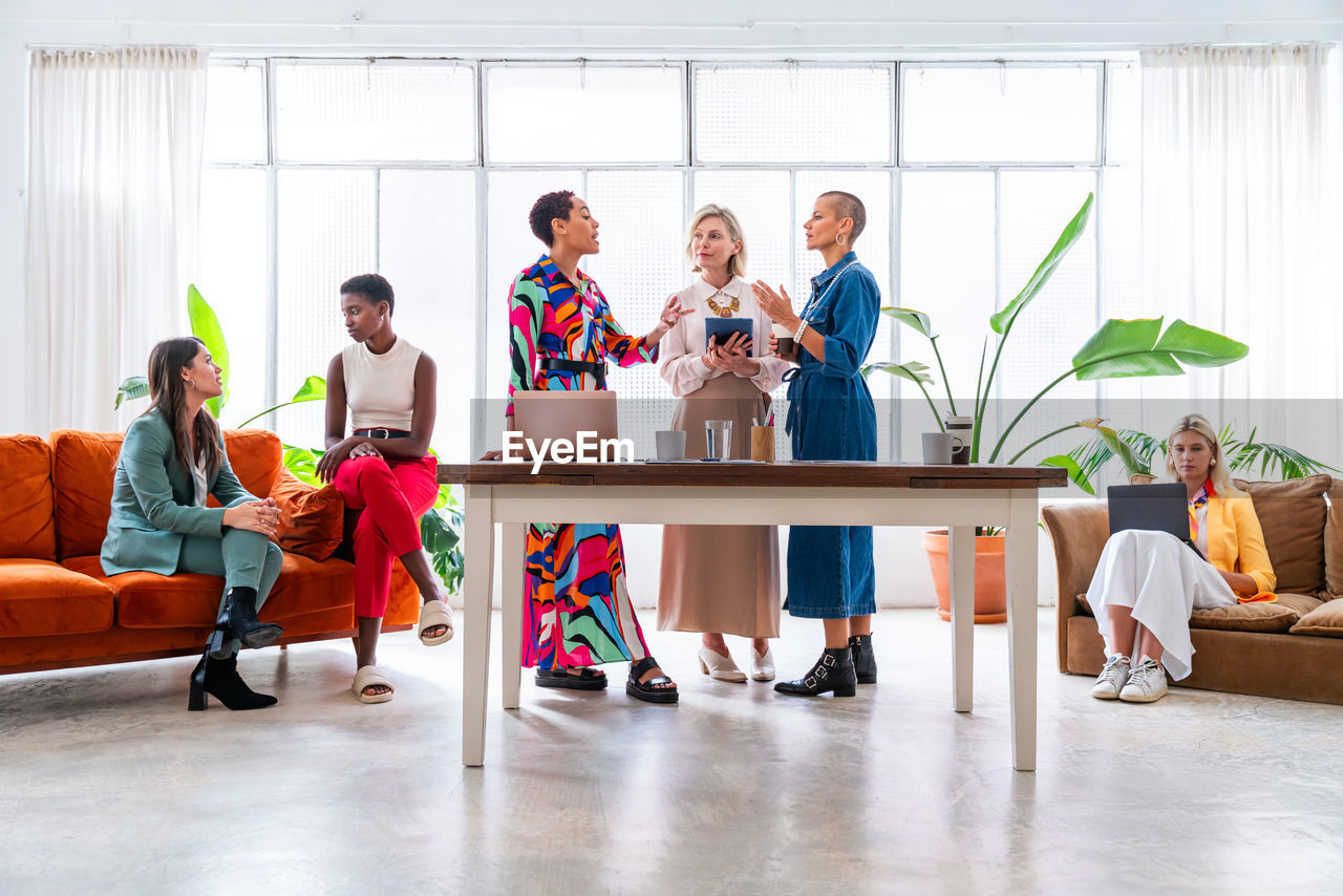 group of business colleagues working on table