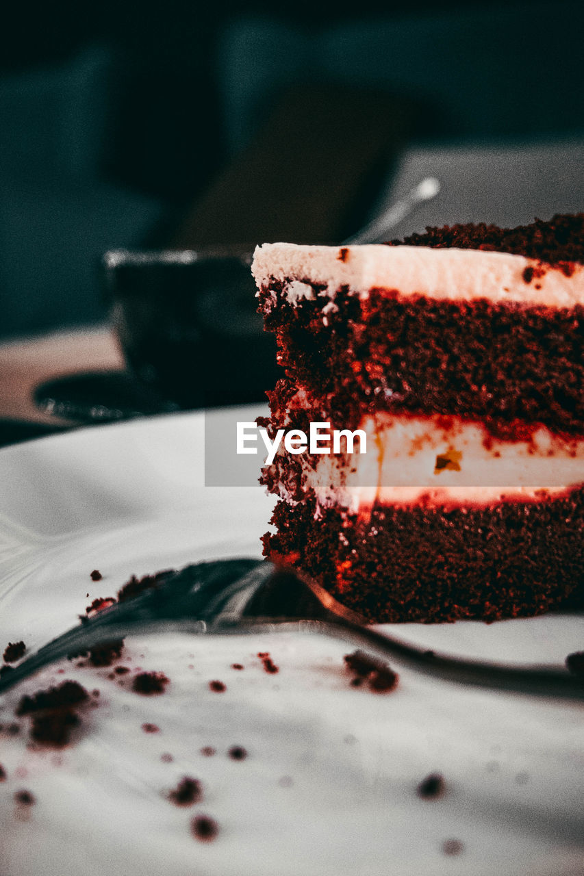 red, food, food and drink, black, sweet food, dessert, sweetness, cake, sweet, indoors, birthday cake, close-up, freshness, macro photography, chocolate cake, no people, plate, berry, temptation, chocolate, table, baked, still life