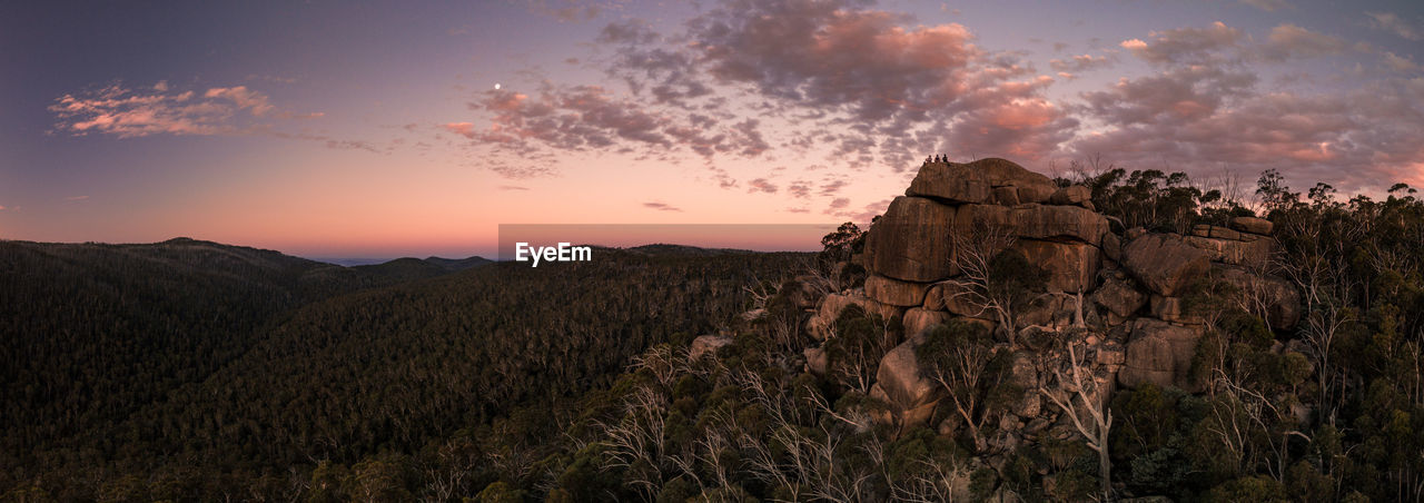 SCENIC VIEW OF MOUNTAINS DURING SUNSET