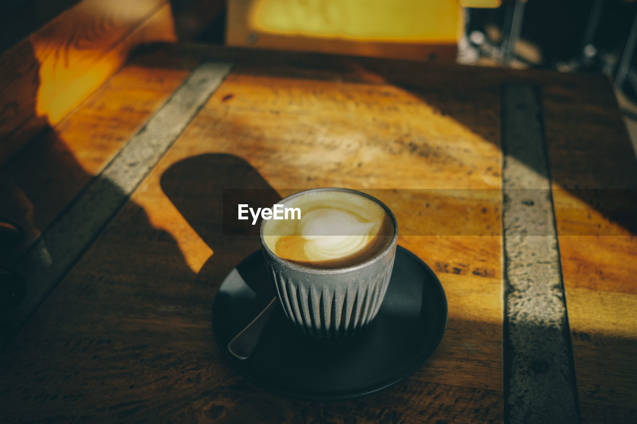 high angle view of cappuccino on table