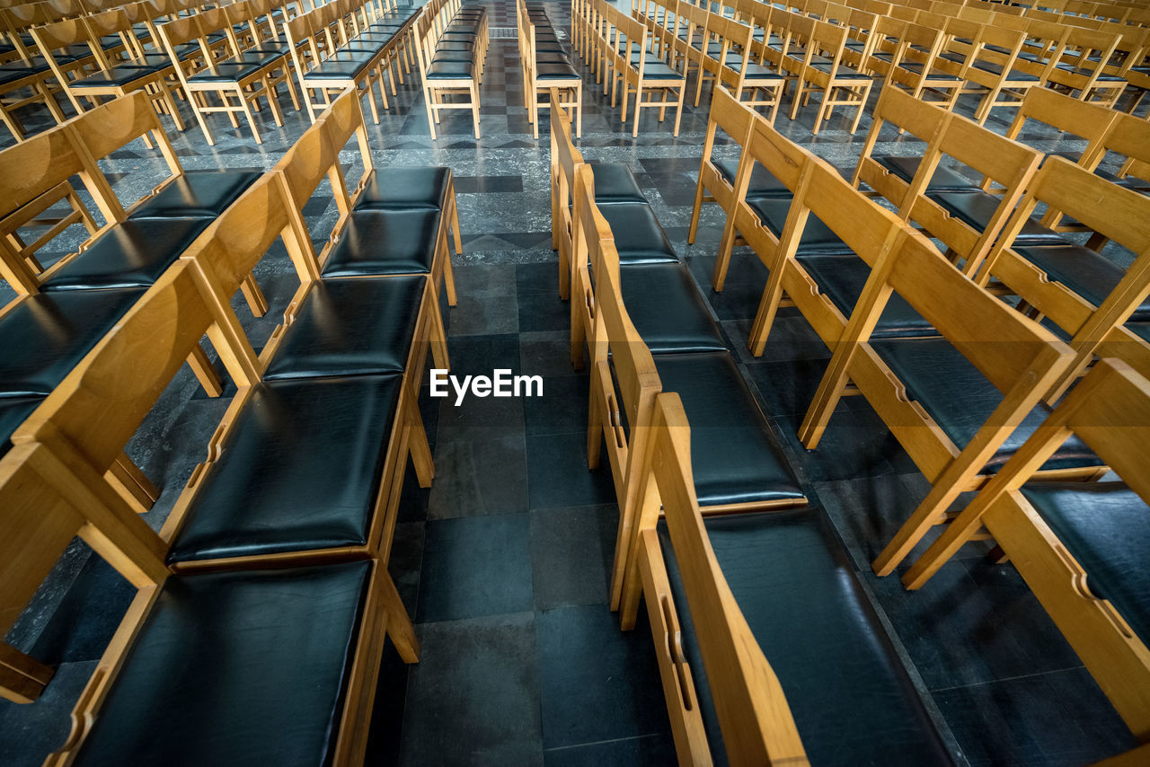 High angle view of empty chairs against church