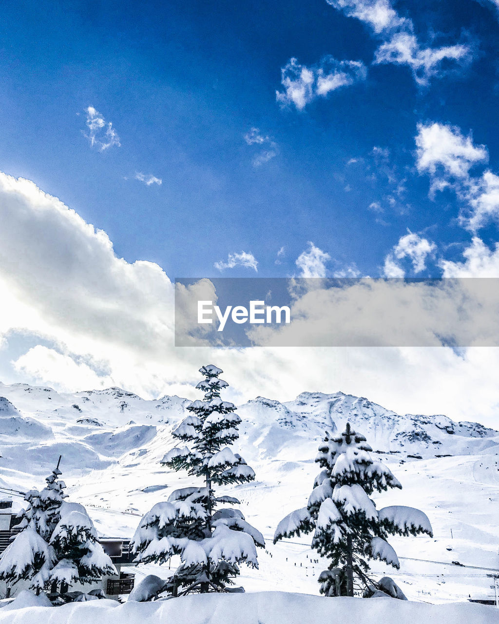 Scenic view of snowcapped mountain against sky