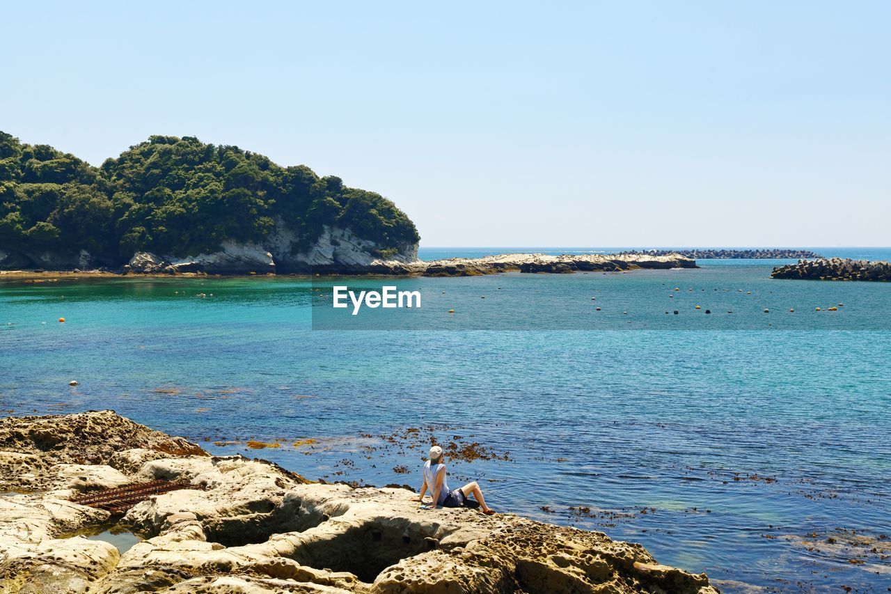 Scenic view of sea against clear sky