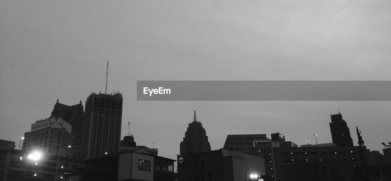 LOW ANGLE VIEW OF BUILDINGS AGAINST SKY